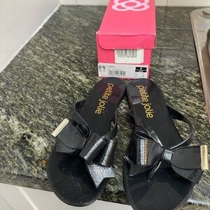 Sandal/black. Never worn.